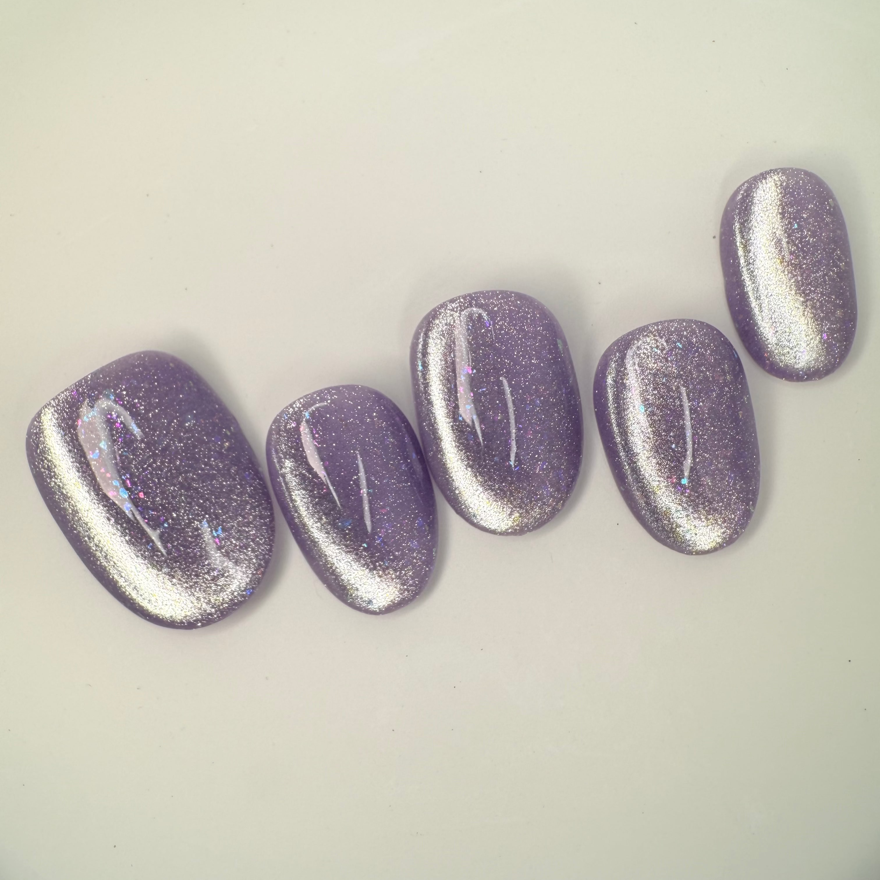 Handmade orchid-inspired press-on nails with shine finish