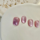 Pink Mist cat eye press-on nails in soft pastel pink with magnetic shimmer