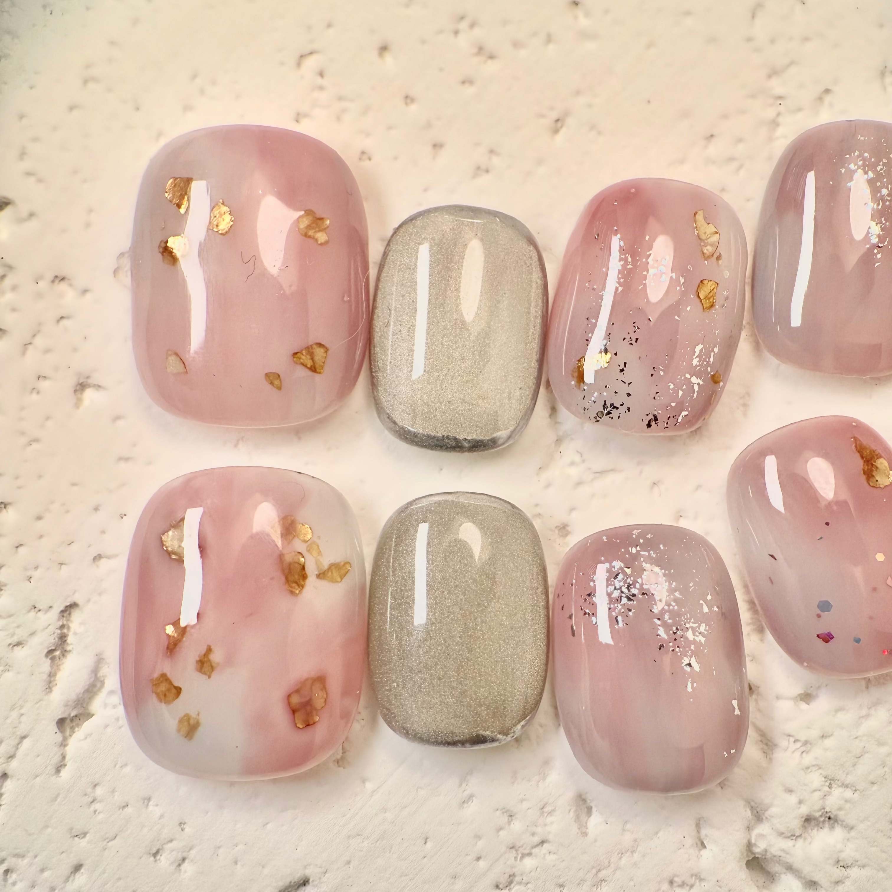 Handmade midnight cat-eye press-on nails with shimmering magnetic effect, Vlei Nails Cape Town South Africa.