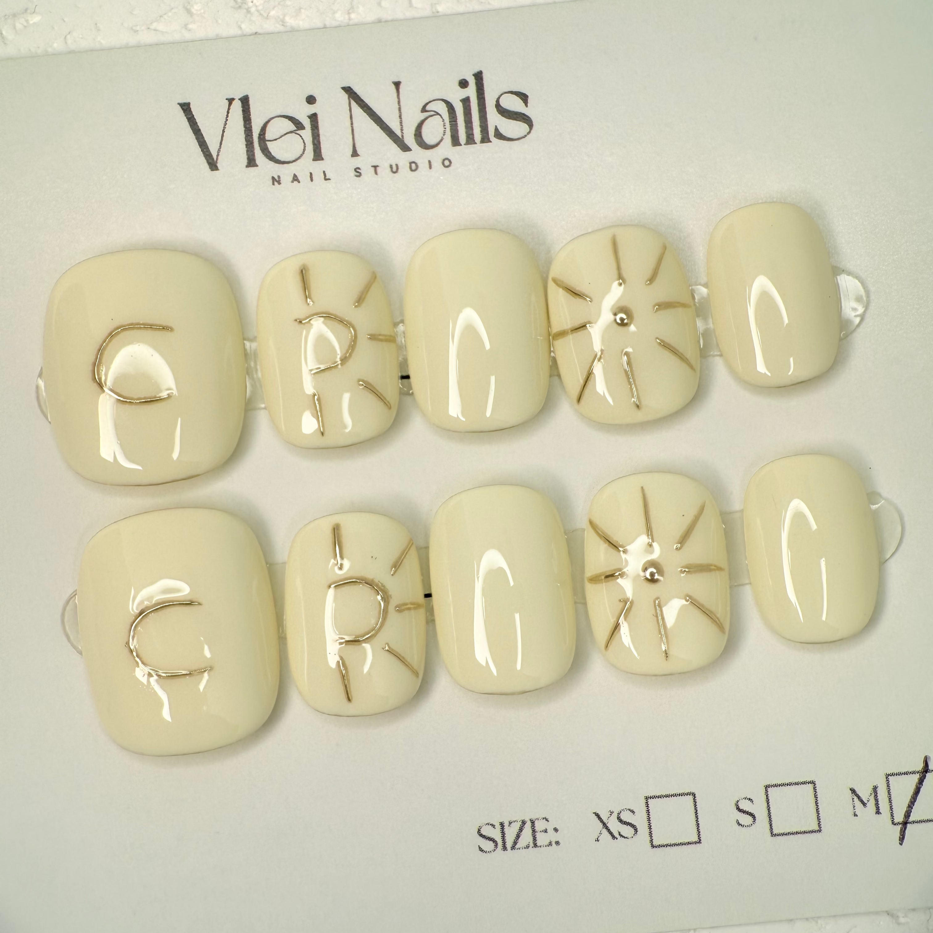 Handmade press-on nails featuring moon and star details