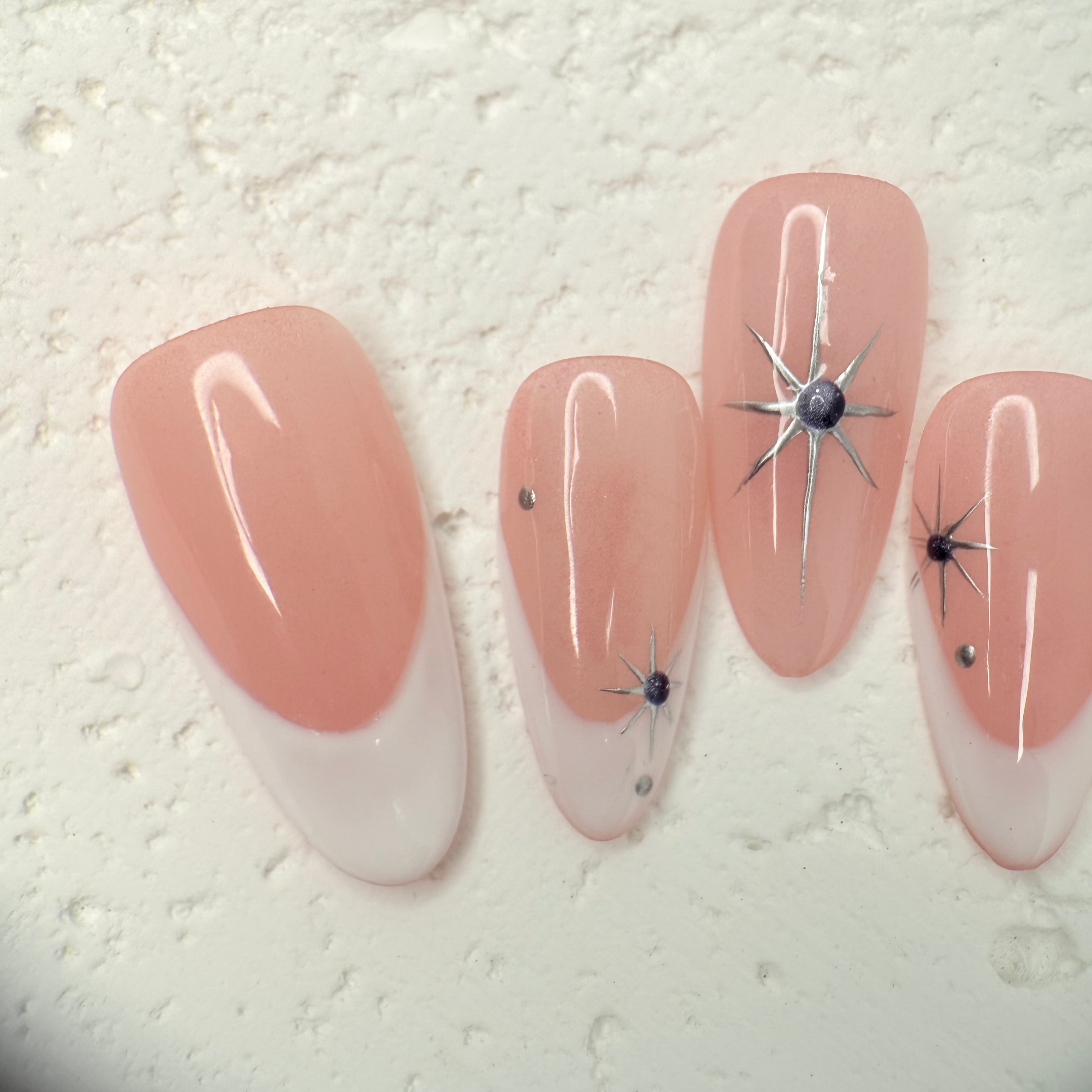 Starry Nude French press-on nails with subtle sparkle
