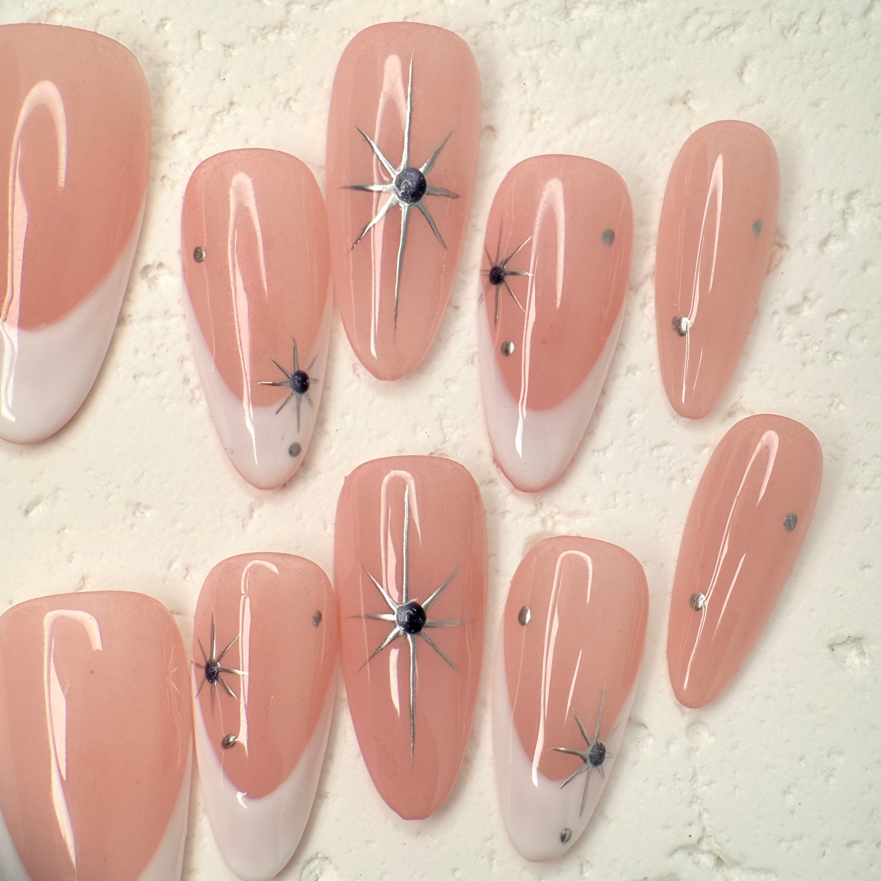 Starry Nude French press-on nails with subtle sparkle

