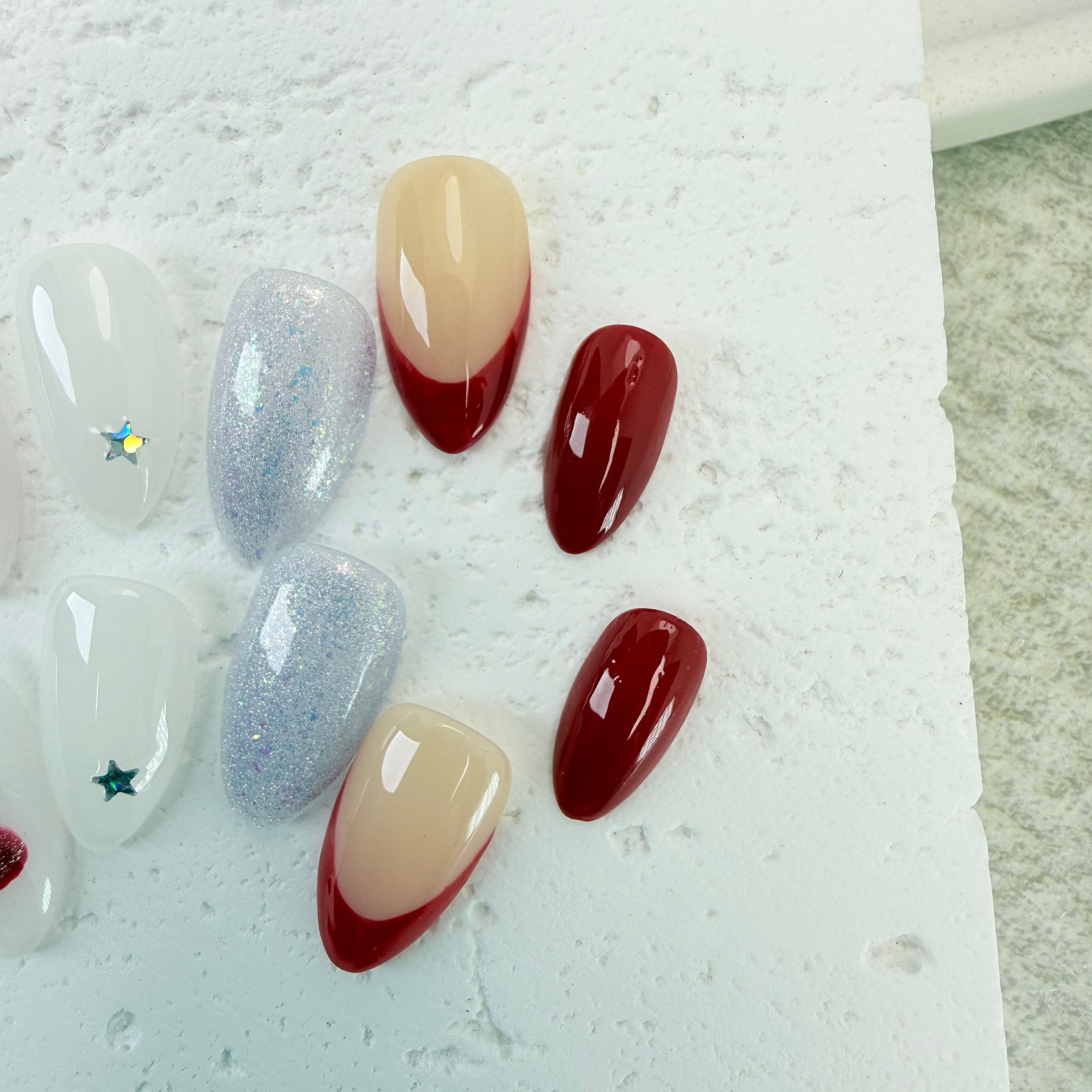 Pink cat-eye press-on nails with glossy shimmer, handcrafted by Vlei Nails Cape Town.
