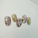 Handcrafted frosted pink and silver press-on nails with metallic shine, and soft pastel tones – made by Vlei Nails Cape Town.
