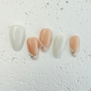 Pink and white French press-on nails with a soft, romantic finish, handcrafted by Vlei Nails Cape Town.
