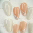 Pink and white French press-on nails with a soft, romantic finish, handcrafted by Vlei Nails Cape Town.
