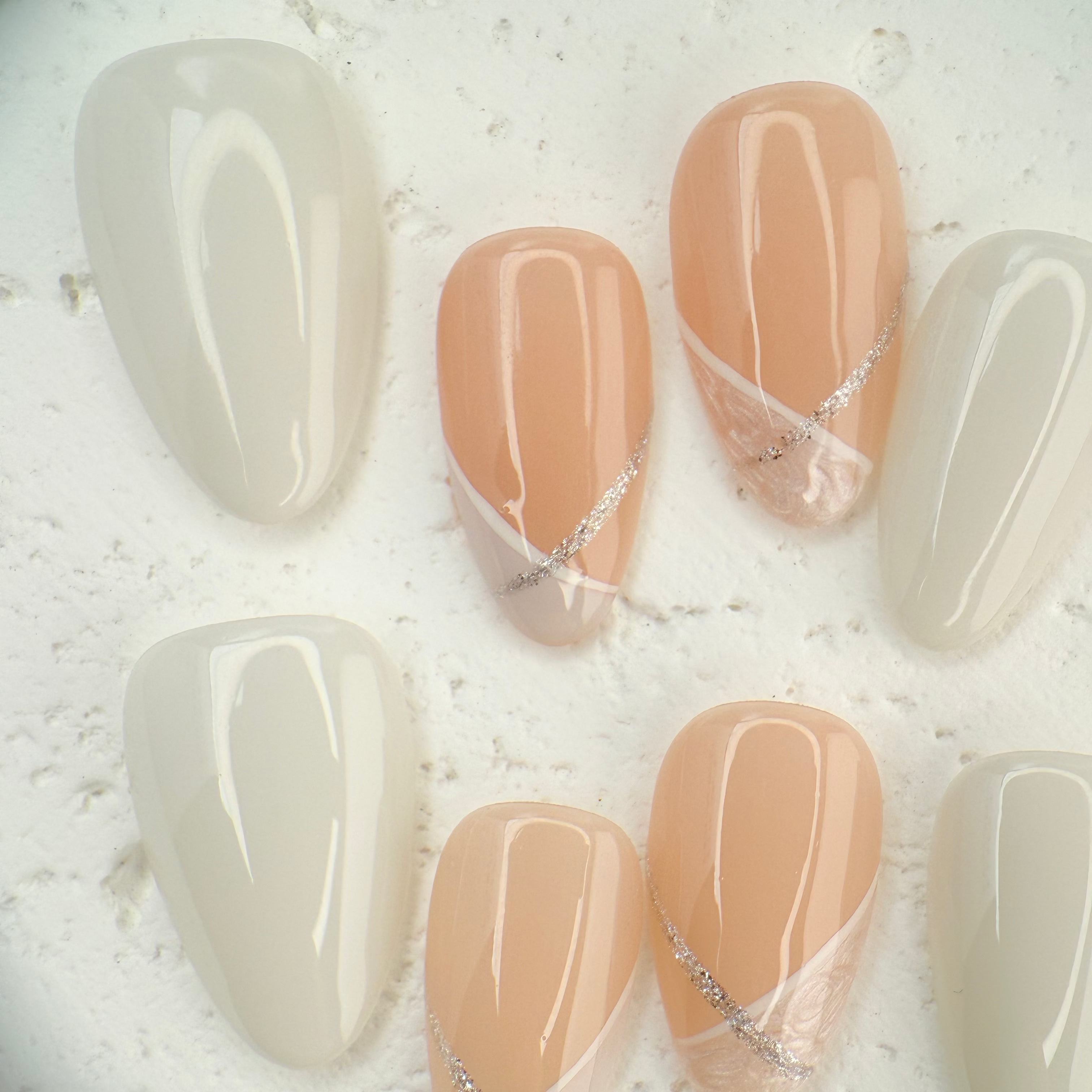 Pink and white French press-on nails with a soft, romantic finish, handcrafted by Vlei Nails Cape Town.
