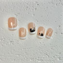 Cat French press-on nails with cute kitty details and white French tips