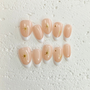 Starry Nude French press-on nails with subtle sparkle