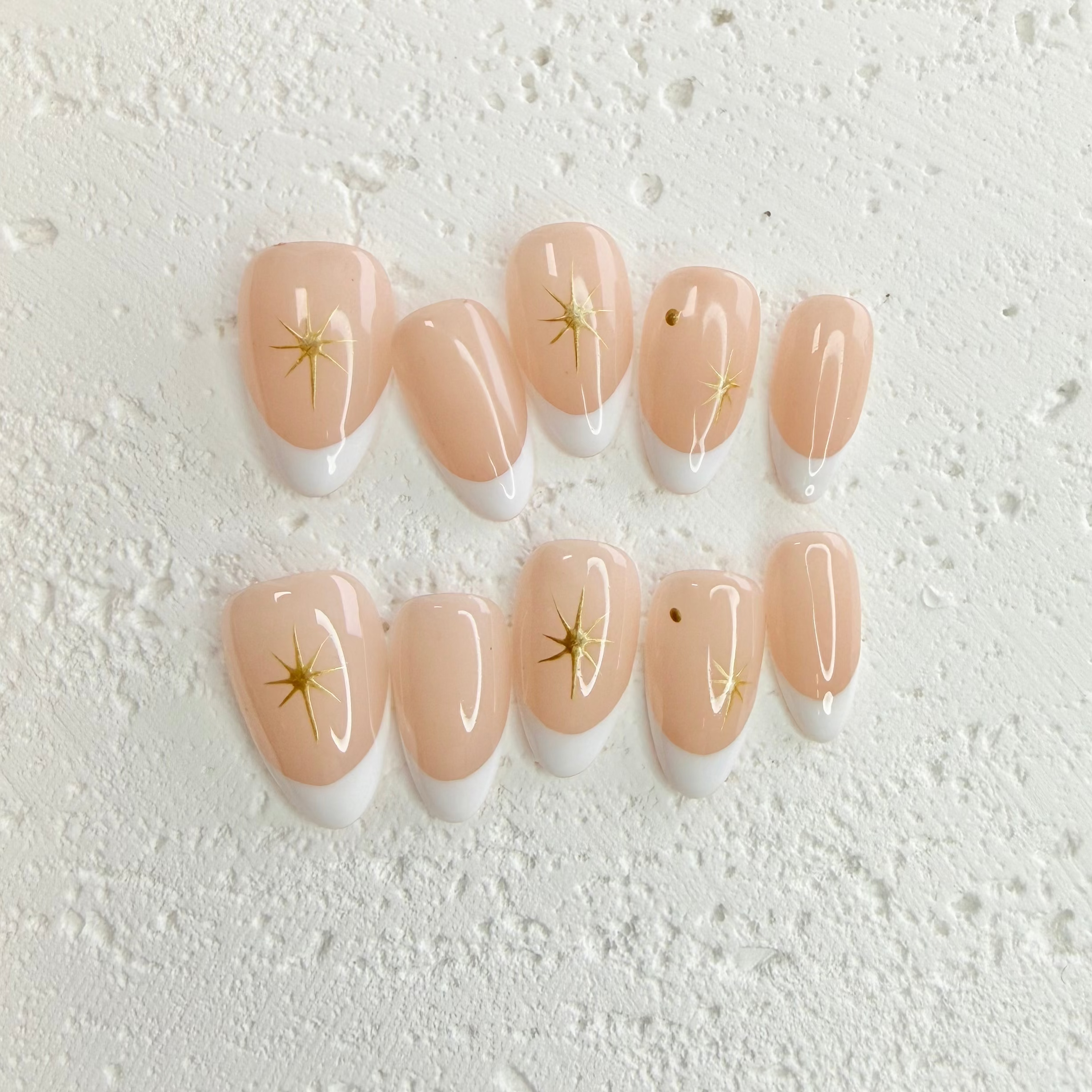 Starry Nude French press-on nails with subtle sparkle