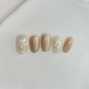 Handmade milky champagne press-on nail set with a luminous finish