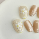 Handmade milky champagne press-on nail set with a luminous finish