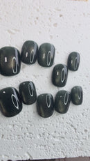 Handmade olive-green press-on nail set with an earthy minimalist style