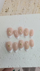 Starry Nude French press-on nails with subtle sparkle