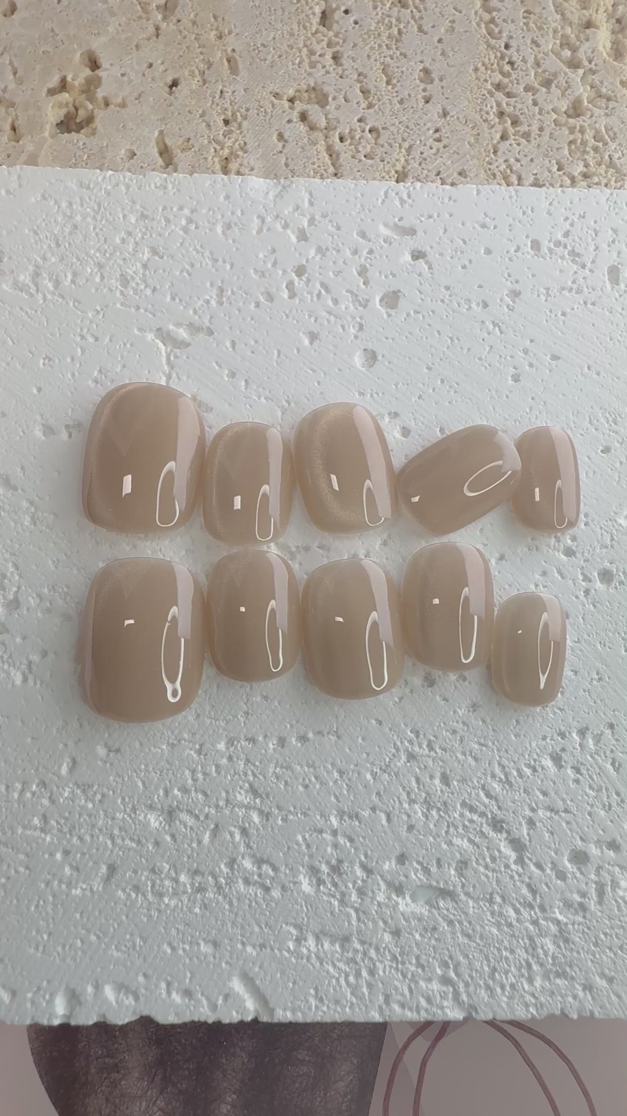 Handmade champagne-toned press-on nail set with silky shine