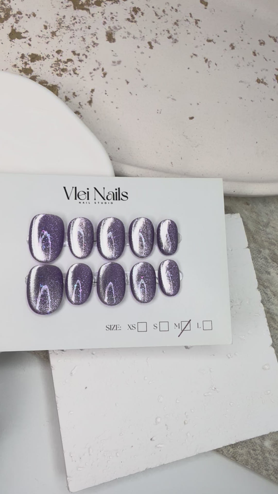 Handmade orchid-inspired press-on nails with shine finish
