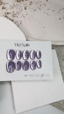 Handmade orchid-inspired press-on nails with shine finish
