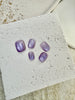 Violet Mist cat eye press-on nails in soft purple with magnetic shimmer effect